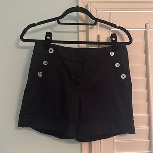 Black button detail shorts